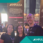 IMPULSA Suite en StartCo 2026 Medellín — equipo en el stand G11